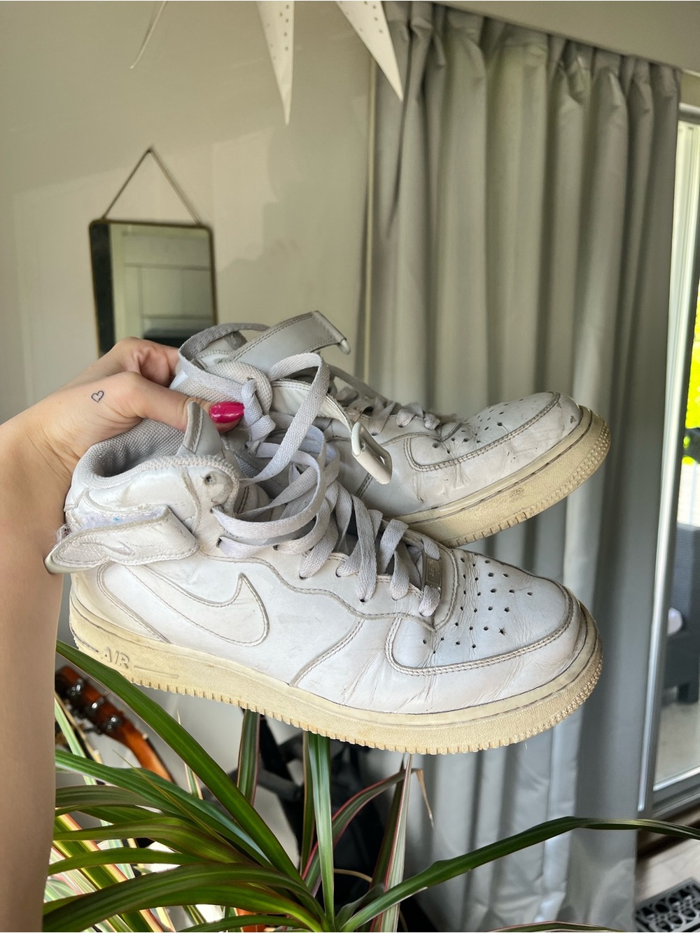 Nike White High-Top Sneakers with Cream Sole